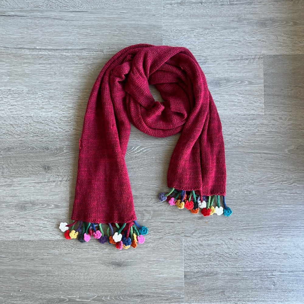 red scarf with crochet flower fringe